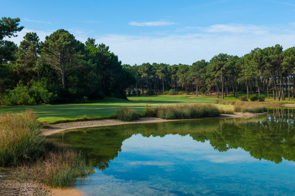 Lake surrounding the fairway at Aroeira Challenge Golf Course
