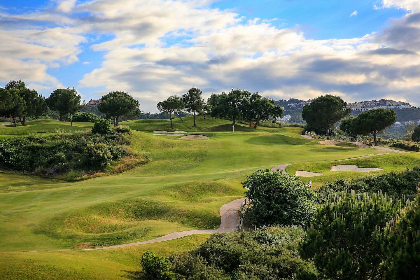 Fairway of hole 6 on America course leading to green on America course at La Cala Golf Resort
