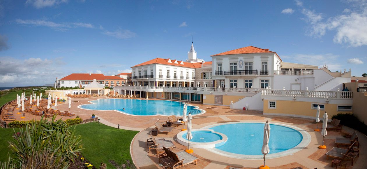 Rear of Marriott Praia DEl Rey Resort with swimming pools surrounded by sun loungers