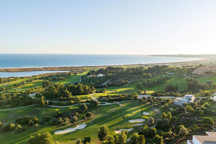 Green fairway and sand bunkers at Palmares Ocean and Living Golf Club