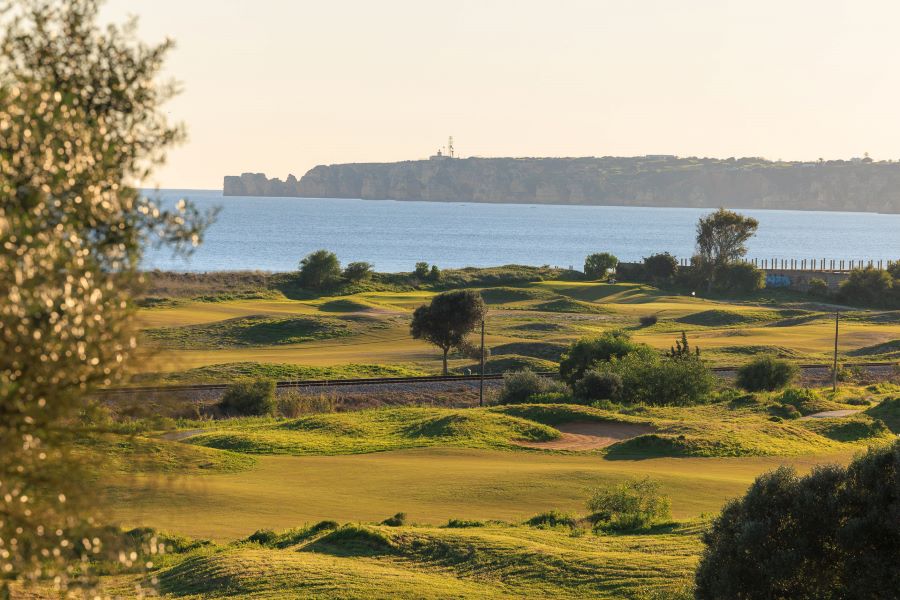 Blue sea in the distance and golf course in the foreground at Palmares Ocean and Living Golf Club