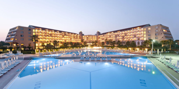 Kaya Belek Hotel overlooking the swimming pool in the evening