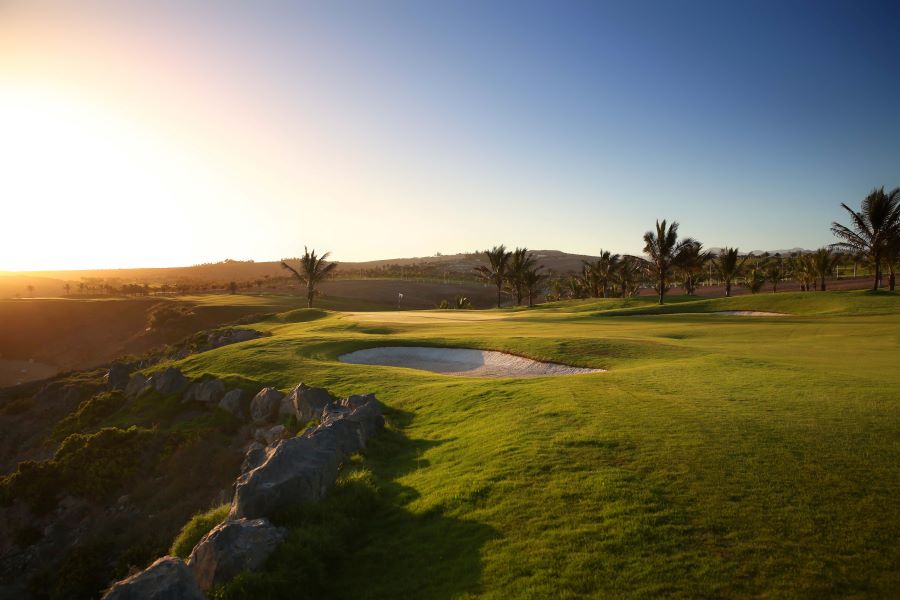 Sun setting over Lopesan Melonares Golf Course in Gran Canaria, Spain