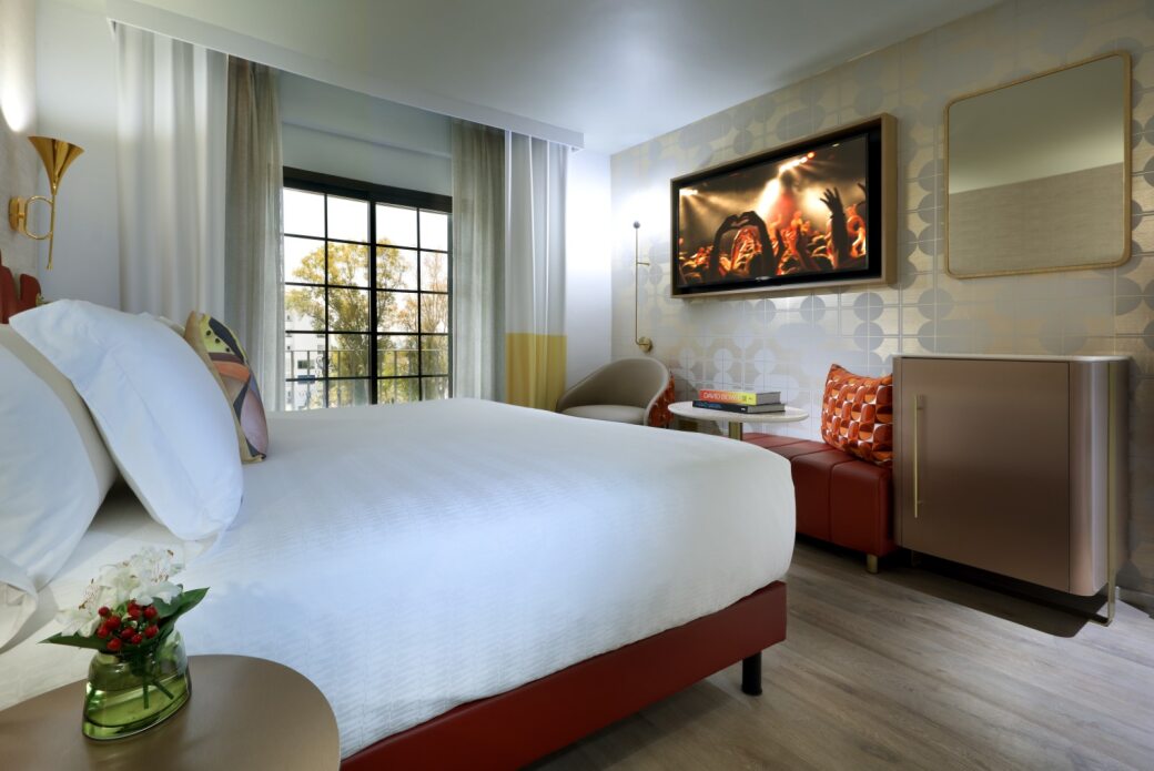 Bedroom with television on the wall at Hard Rock Hotel Marbella in Puerto Banus