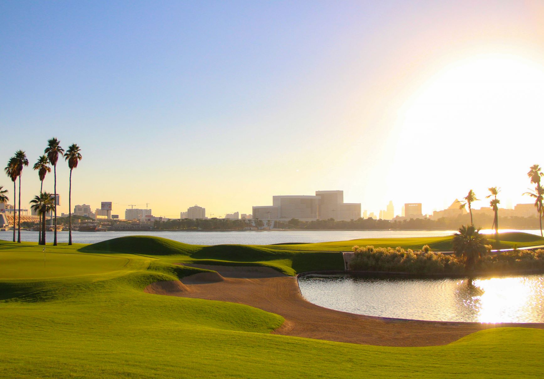 Dubai Creek Golf Club with sand protecting the green