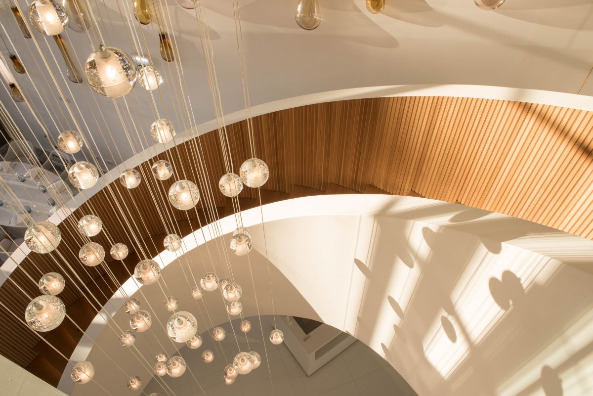 Winding staircase with wood panels at Aroeira Lisbon Hotel