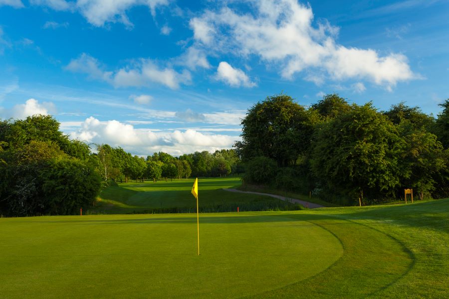 Yellow flag on the putting green at Belton Woods Hotel, Spa And Golf Resort