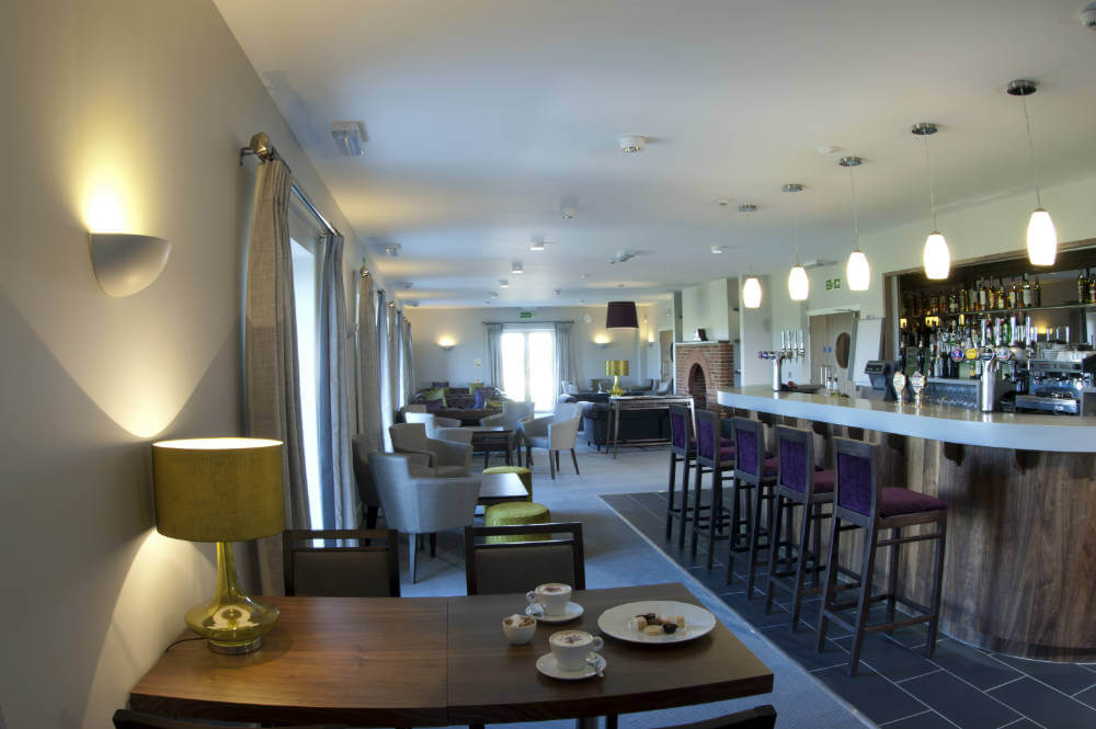 Bar area with coffee served on a table at Prince's Golf Club