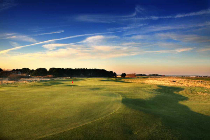 Ariel shot of the green with the flag in at Prince's Golf Club