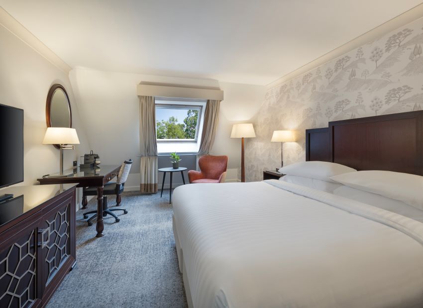 Double bedroom at Delta Hotels by Marriott Worsley Park Country Club