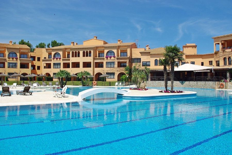 Swimming pool with bridge at La Costa Golf and Beach Resort