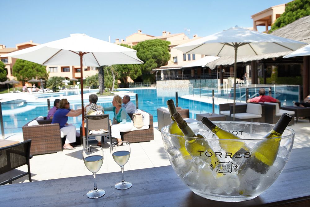 Bottle of wine by the pool at La Costa Golf and Beach Resort