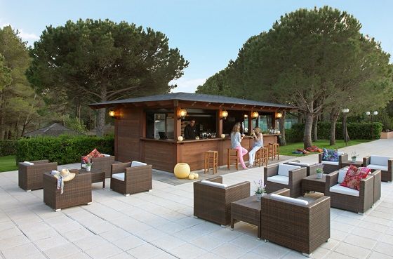 La Costa Golf and Beach Resort pool bar with seats and chairs