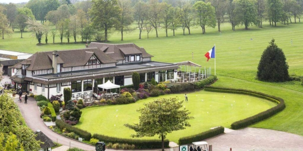Practice putting green in front of club house at Hotel Barriere L'Hotel du Golf Deauville
