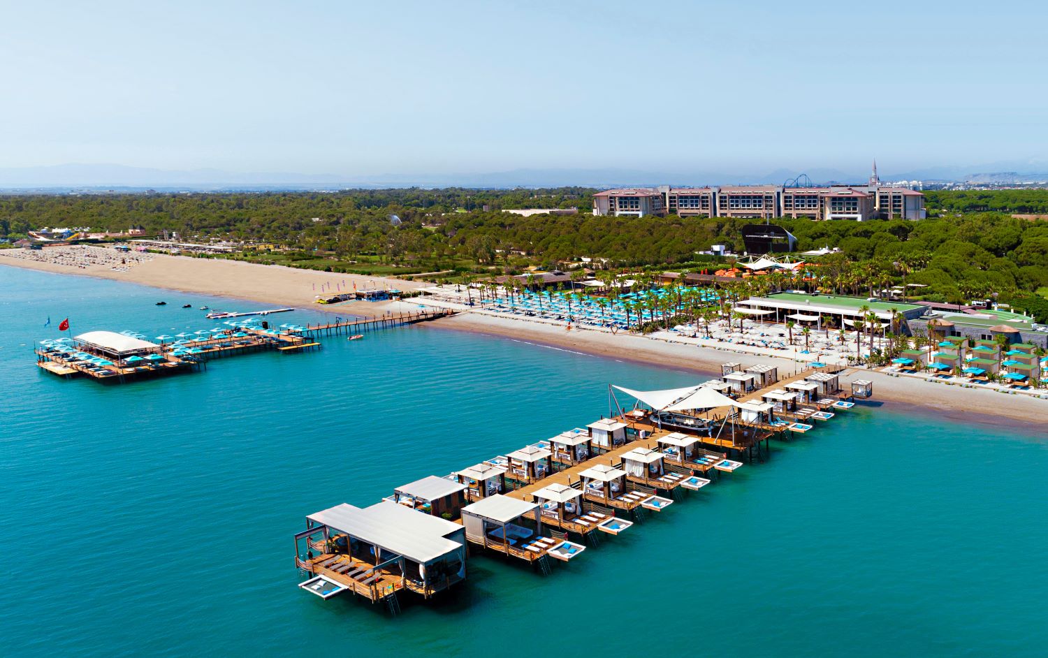 Pier with beach at Regnum Carya Golf And Spa Resort in Belek, Turkey