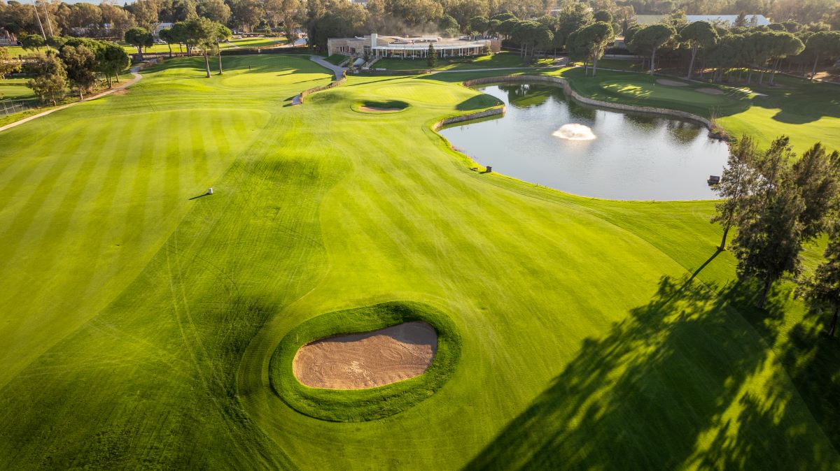 Bunker in the foreground and lake in the distance at Kaya Palazzo Golf Club