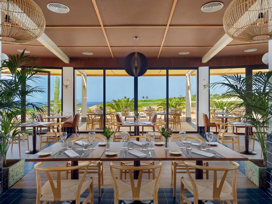 Dining tables set for guests in all-inclusive resort of H10 Playa Meloneras Horizons Collection