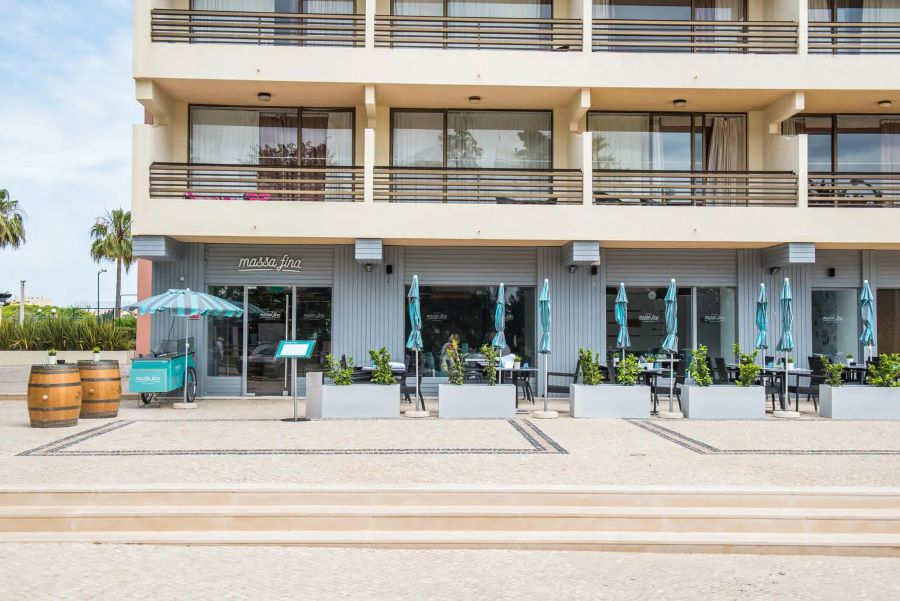 Cafe tables and chairs at Vila Gale Ampalius