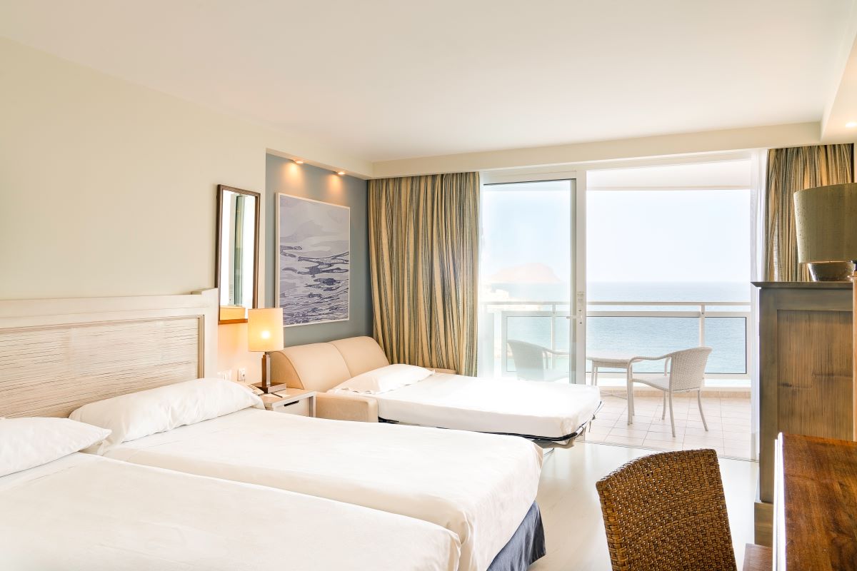 Twin beds and sofa in Hotel Tenerife Golf and Sea View in the Canary Islands