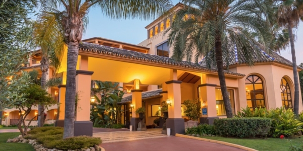 Entrance decorated with palm trees at Guadalmina Hotel Spa And Golf Resort