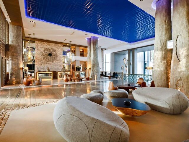 Sofitel Essaouira Mogador Golf And Spa lobby area with stone themed seats