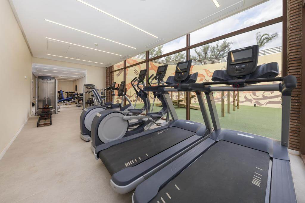 Indoor gym with cardio machines at Be Live Experience Marrakech Palmeraie