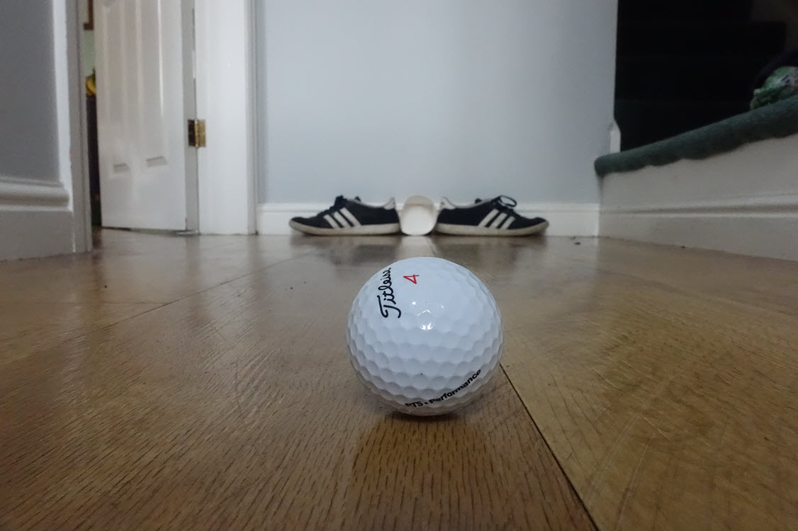 Practice golf at home with a pair of shoes