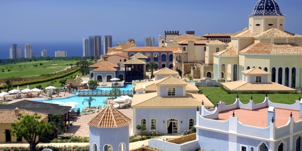 Melia Villaitana Golf Resort with views of the surrounding golf course, Benidorm skyline and the sea in the distance