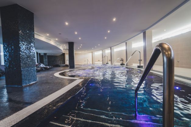 Indoor swimming pool at Gara Suites Golf And Spa