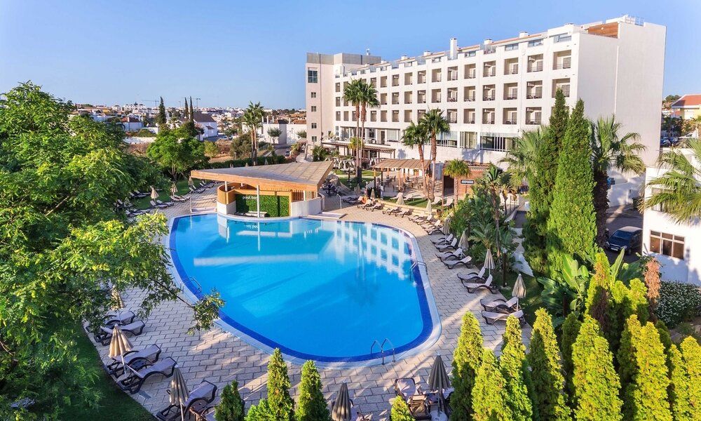 AP Maria Nova Lounge Hotel overlooking its outdoor swimming pool