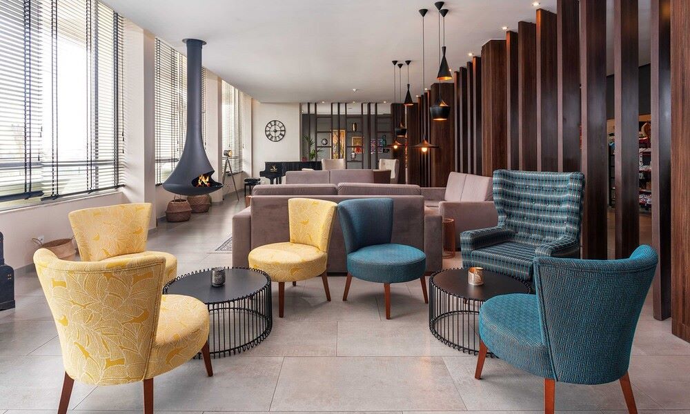Seating area in lobby at AP Maria Nova Lounge Hotel