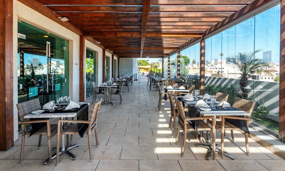 Outdoor seating area at AP Maria Nova Lounge Hotel