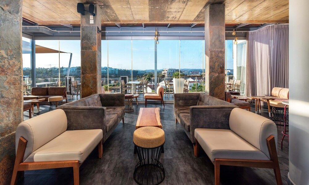 Sofas and tables at AP Maria Nova Lounge Hotel