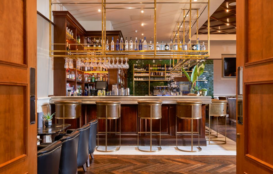 Bar with stools at Druids Glen Hotel And Golf Resort