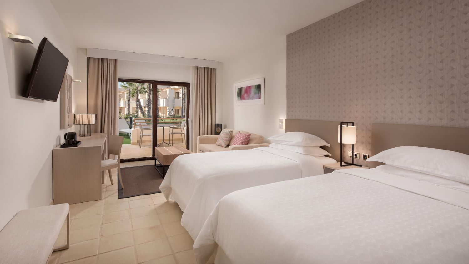 Twin bedroom in suite at Hacienda Del Alamo Golf Resort in Murcia, Spain