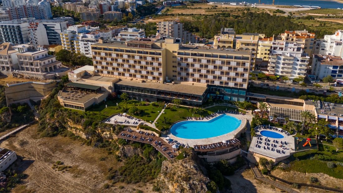 Hotel Algarve Casino on cliff top, just behind the beach