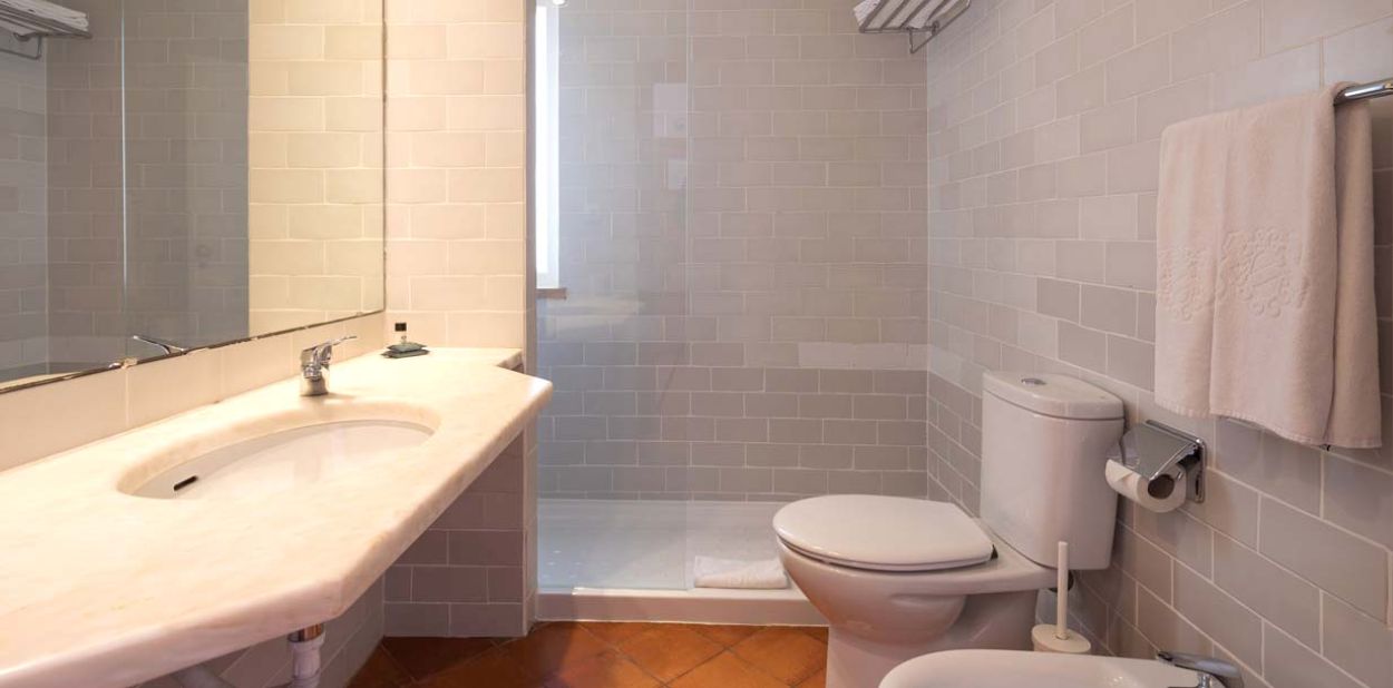 Shower cubicle in bathroom at Dom Pedro Lagos Hotel