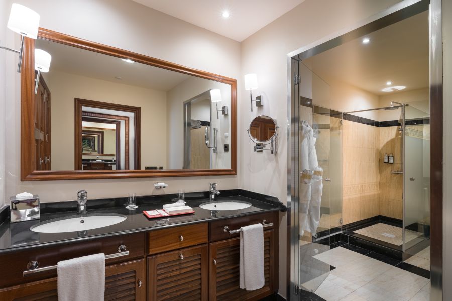 Bathroom with twin sinks and separate shower unit at Elba Estepona Gran Hotel & Thalasso Spa