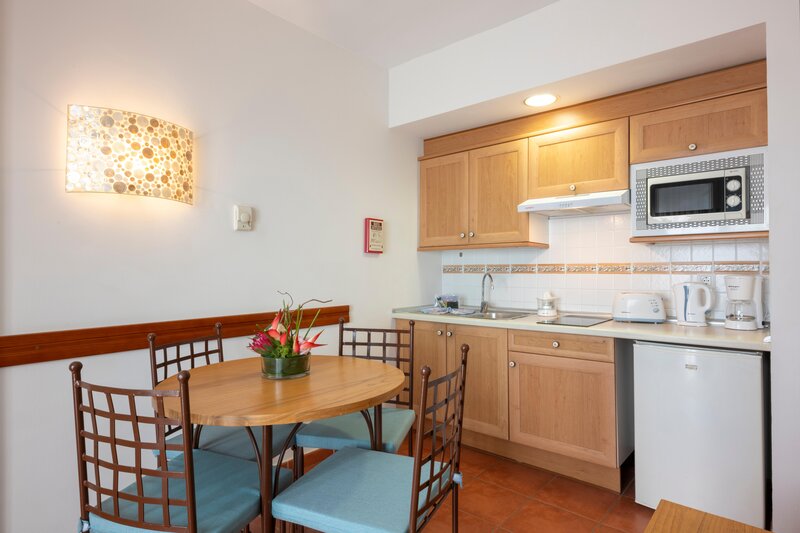 Kitchen area in apartment at GF Isabel